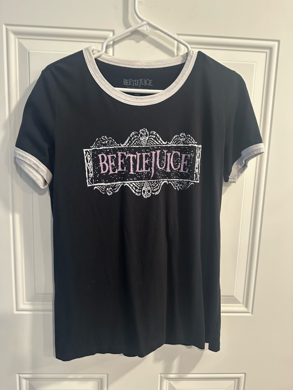 Women's Beetlejuice black t shirt with purple and white vintage logo Tim Burton